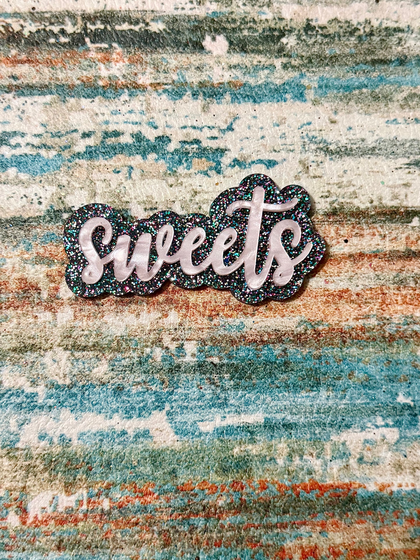 “Multicolored glitter with Baby Pink Pearl name” name clip